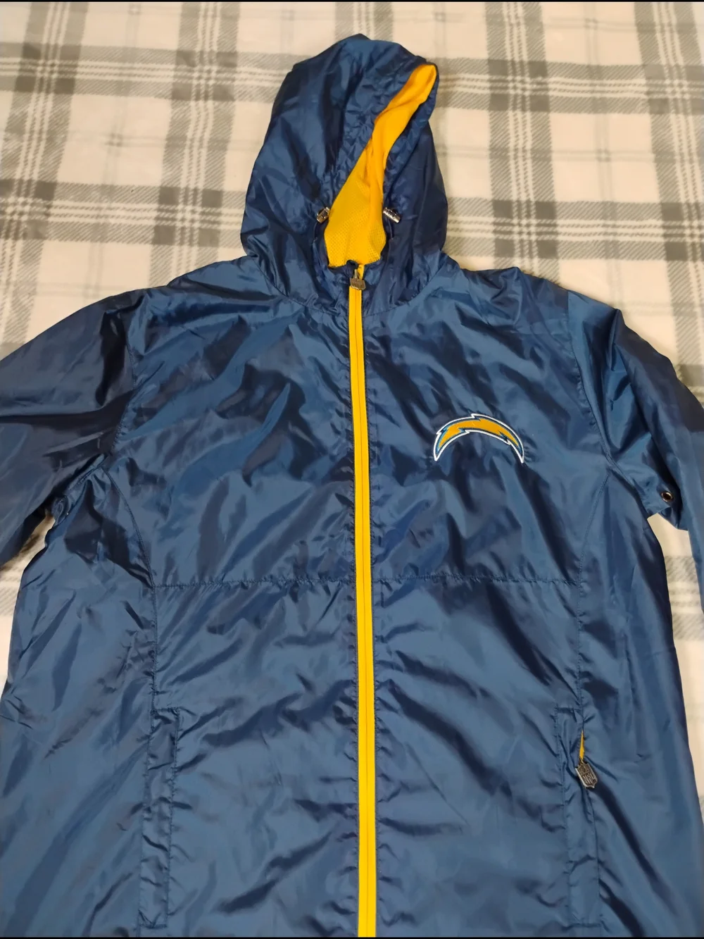 NFL Black Jacket with Red and Blue Shield Logo